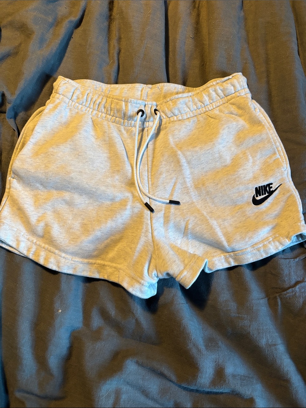 Nike Women's Light Gray Athletic Drawstring Shorts with Black Swoosh